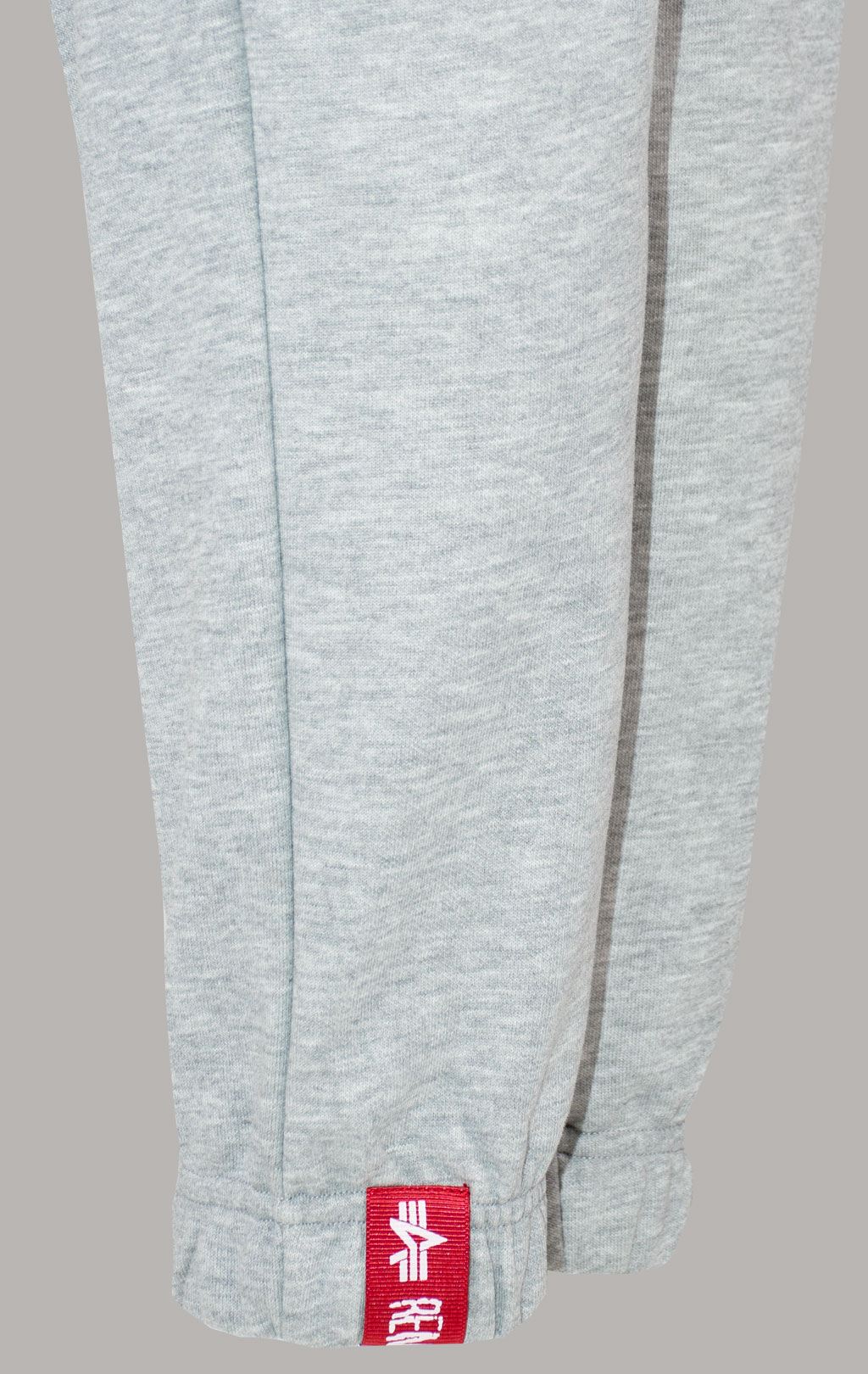 Женские брюки спортивные джоггеры ALPHA INDUSTRIES BASIC JOGGER SMALL LOGO grey heather/white 