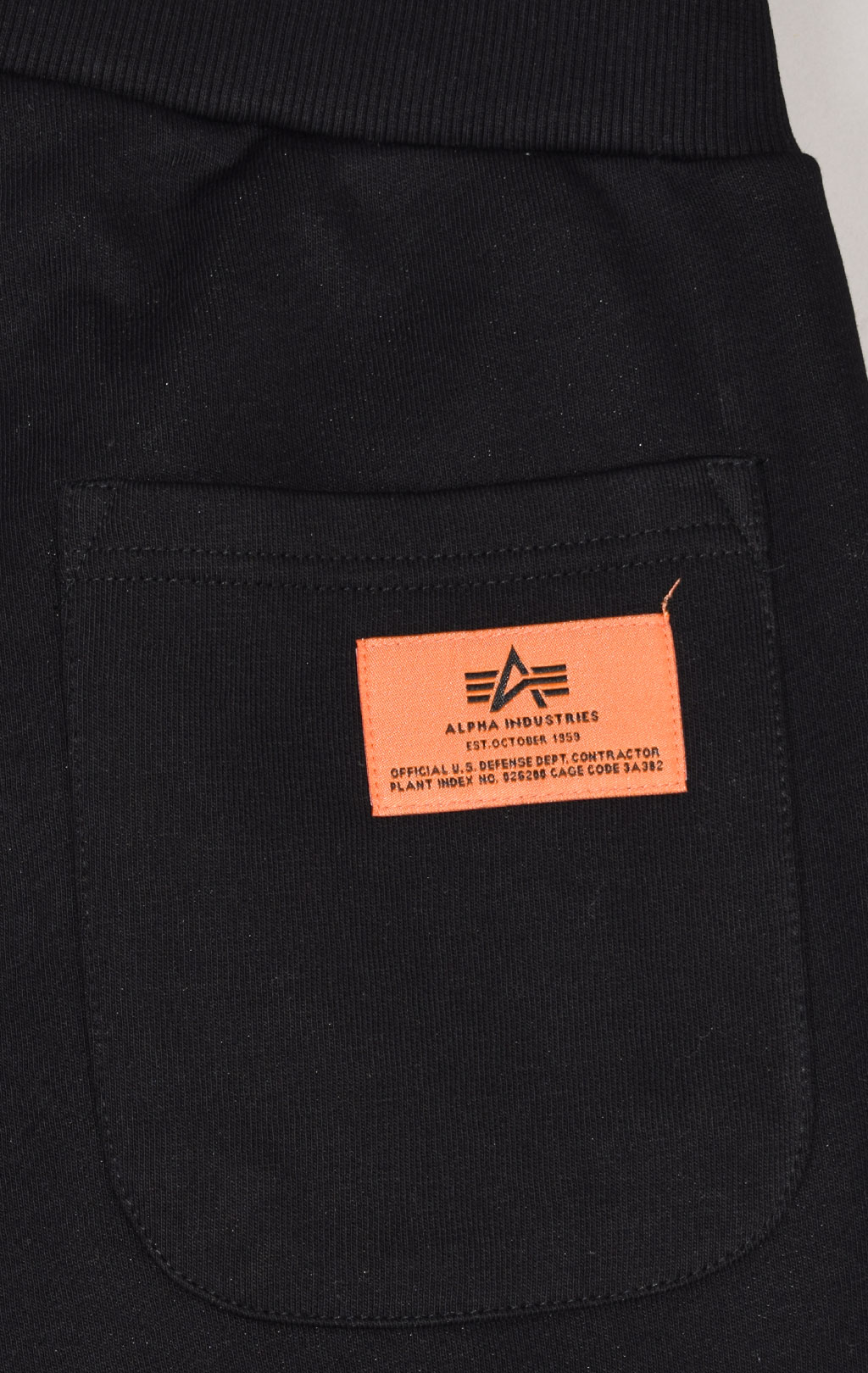 Брюки спортивные джоггеры ALPHA INDUSTRIES DEFENCE JOGGER black/orange 