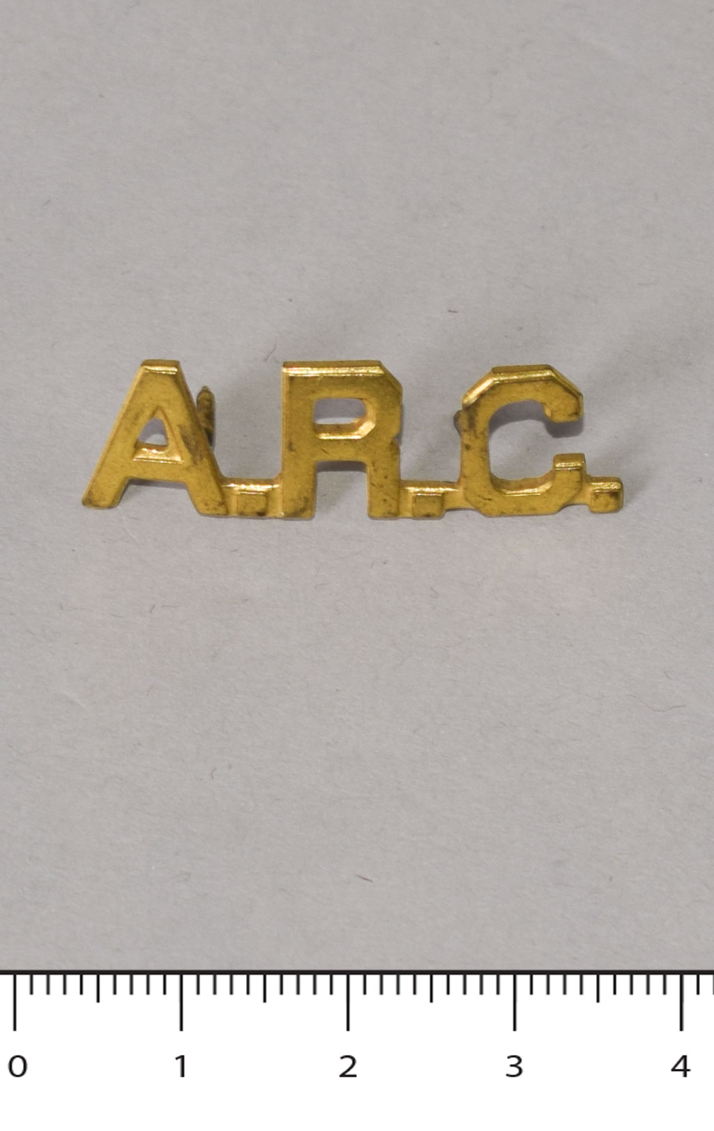 Знак A.R.C. gold 