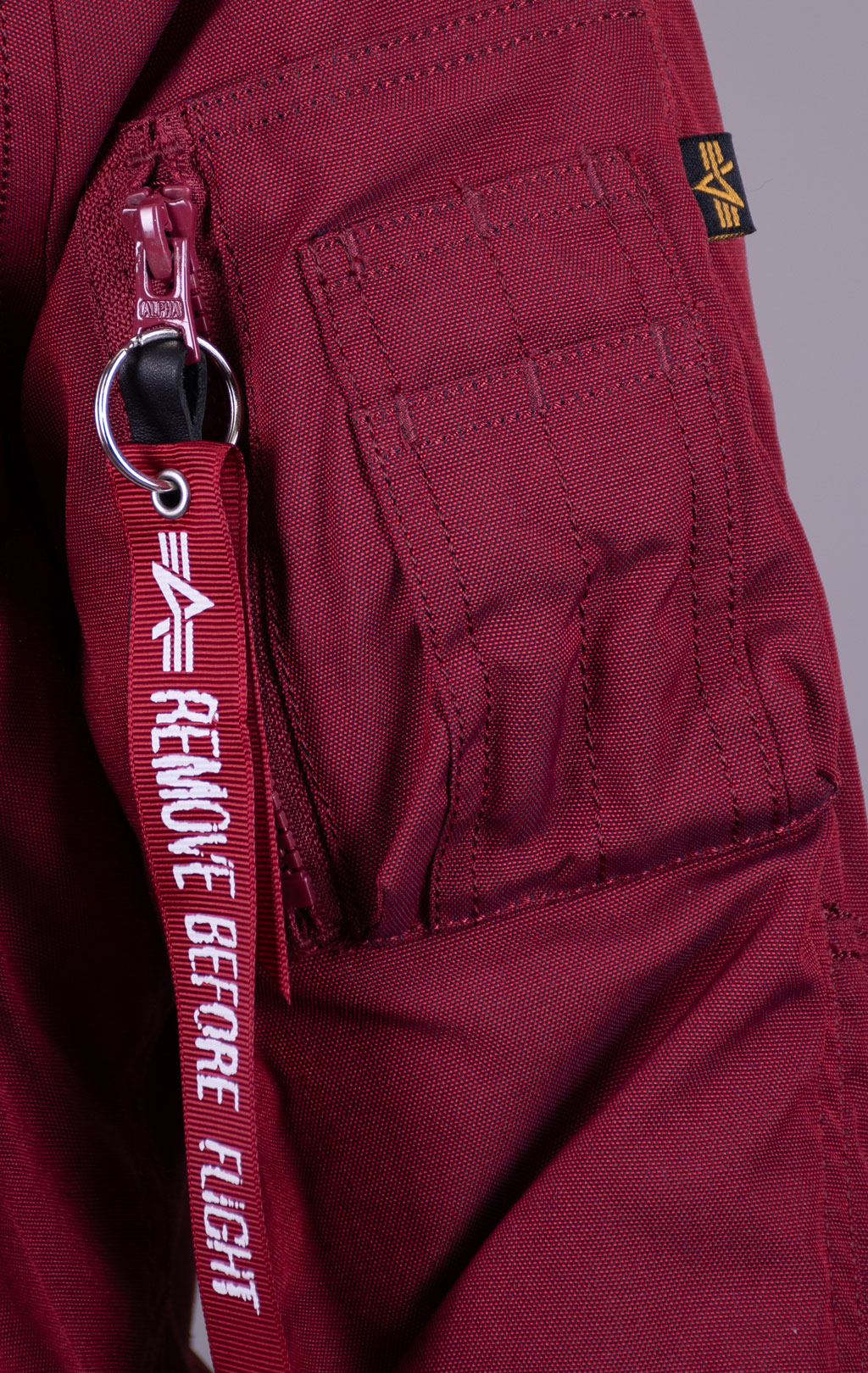 Женская аляска ALPHA INDUSTRIES EXPLORER натур. мех burgundy 