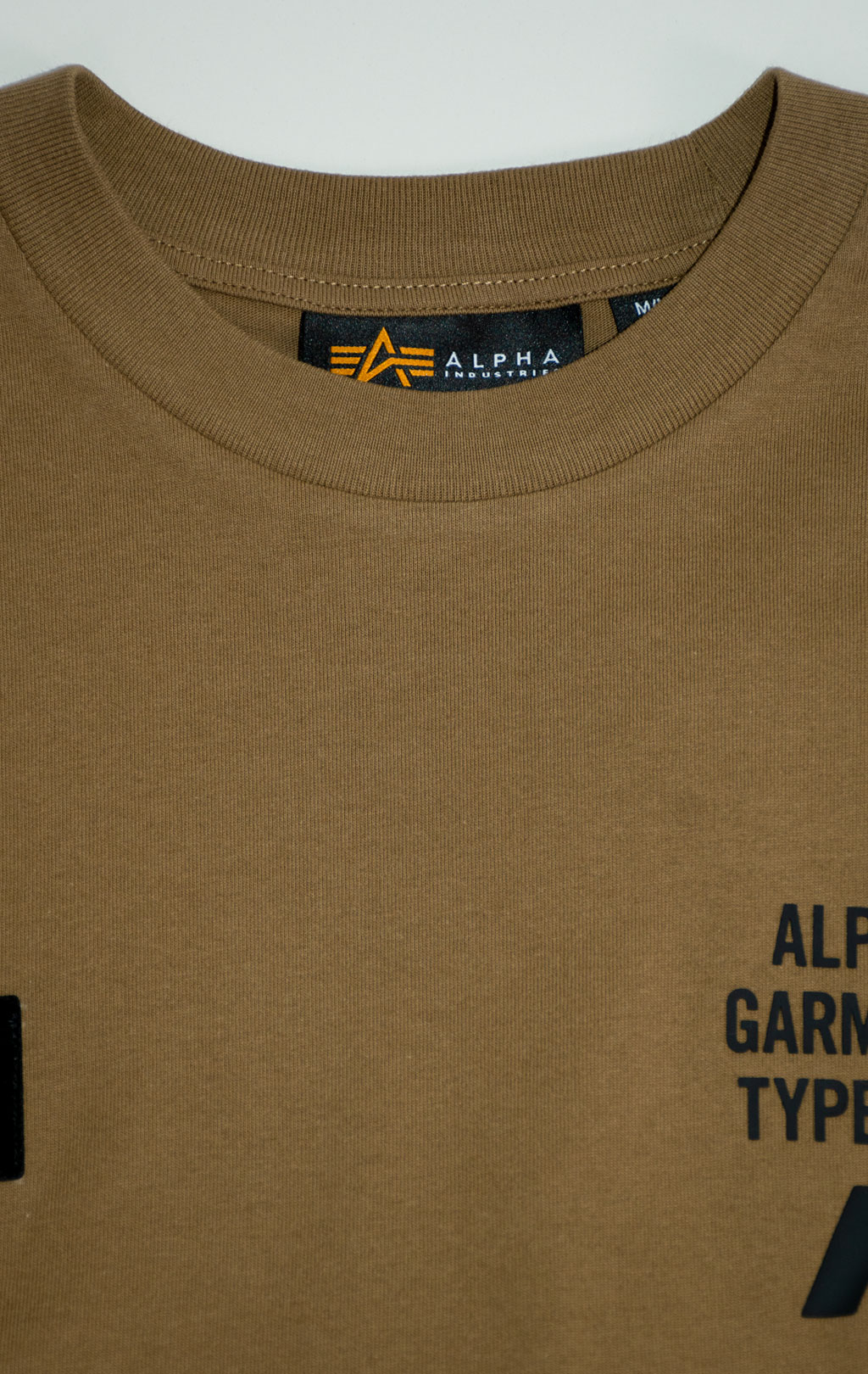 Лонгслив ALPHA INDUSTRIES UNFRM LS GRAPHIC TEE FW 25/26 tan M001150 